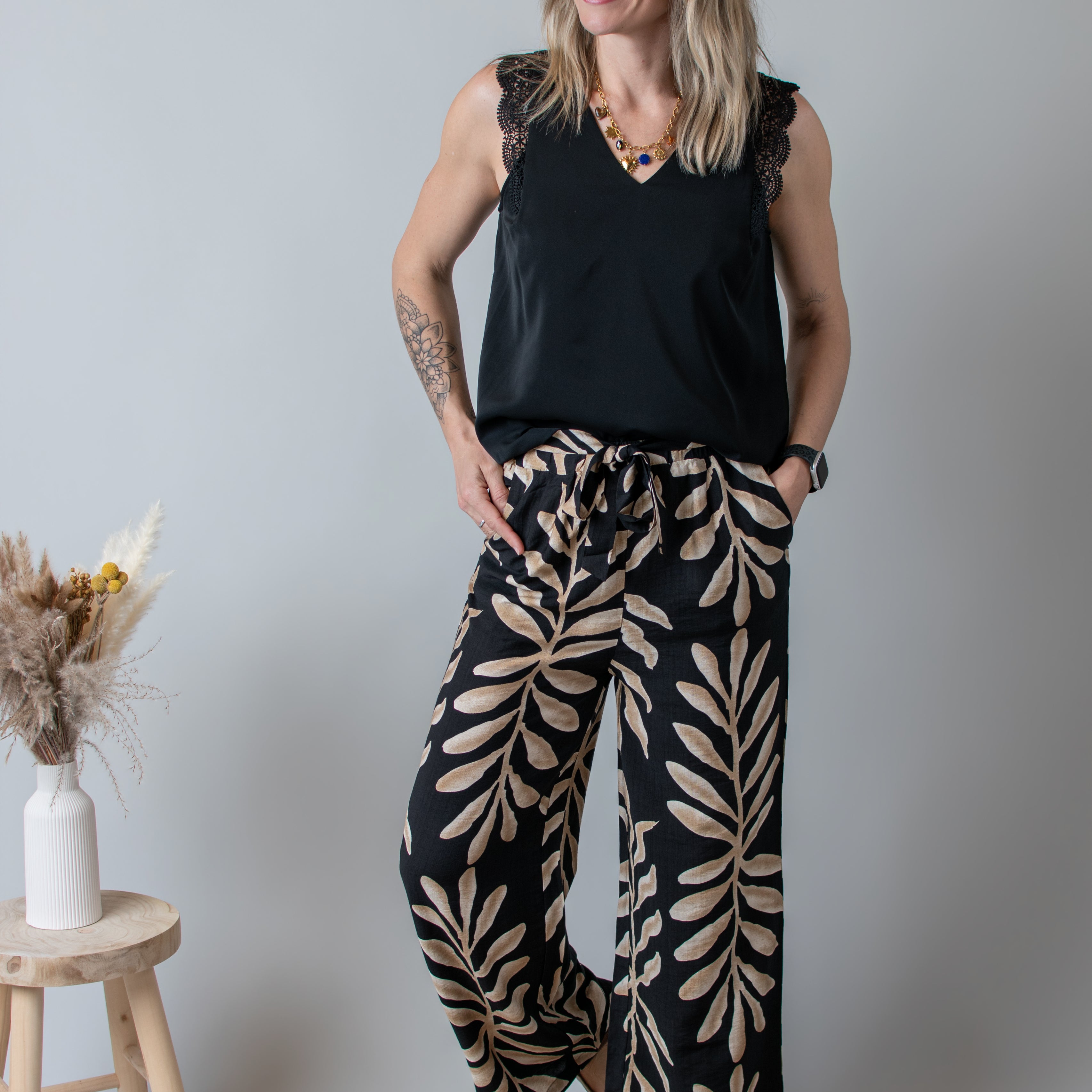 Pantalon fluide noir et beige femme