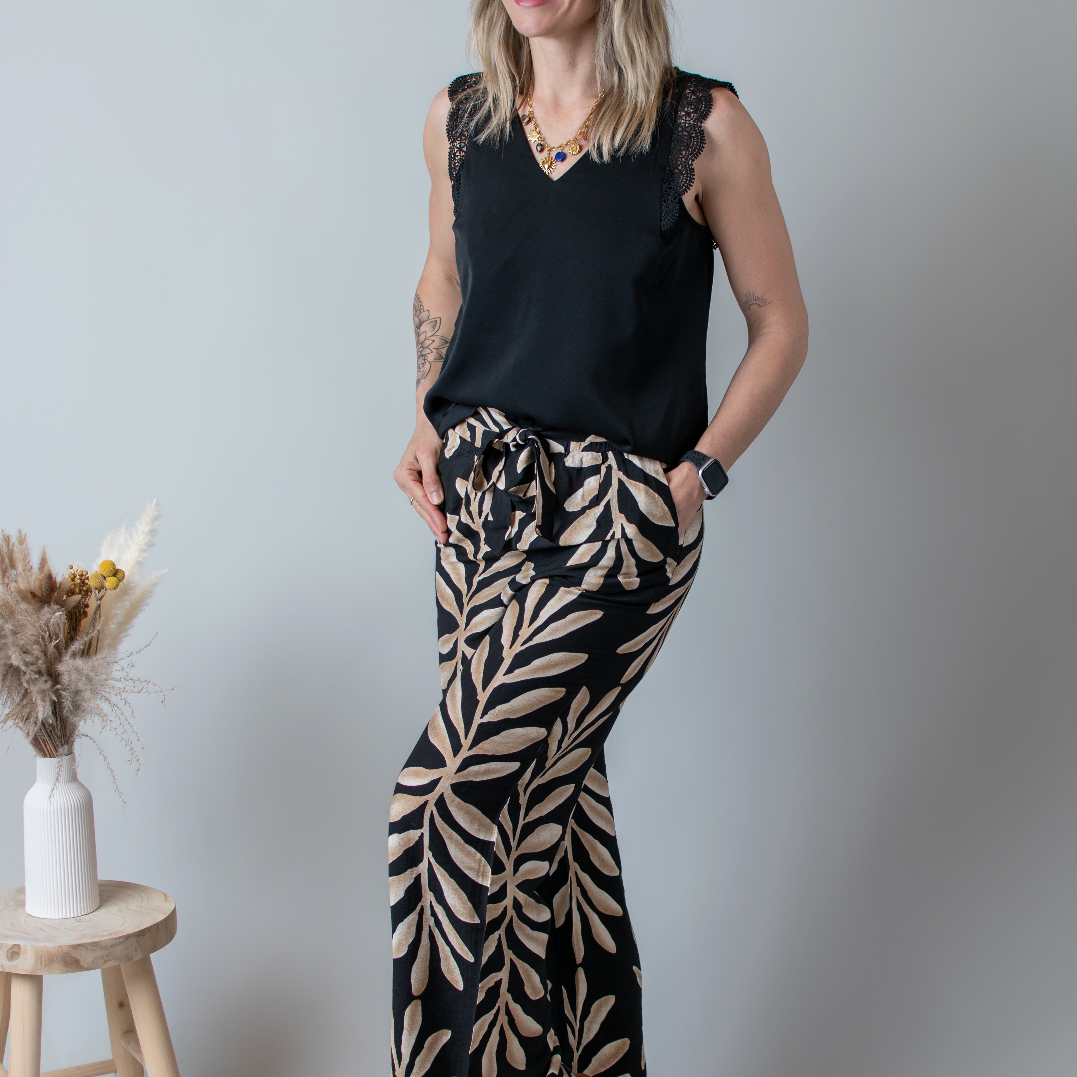 Pantalon fluide noir et beige femme