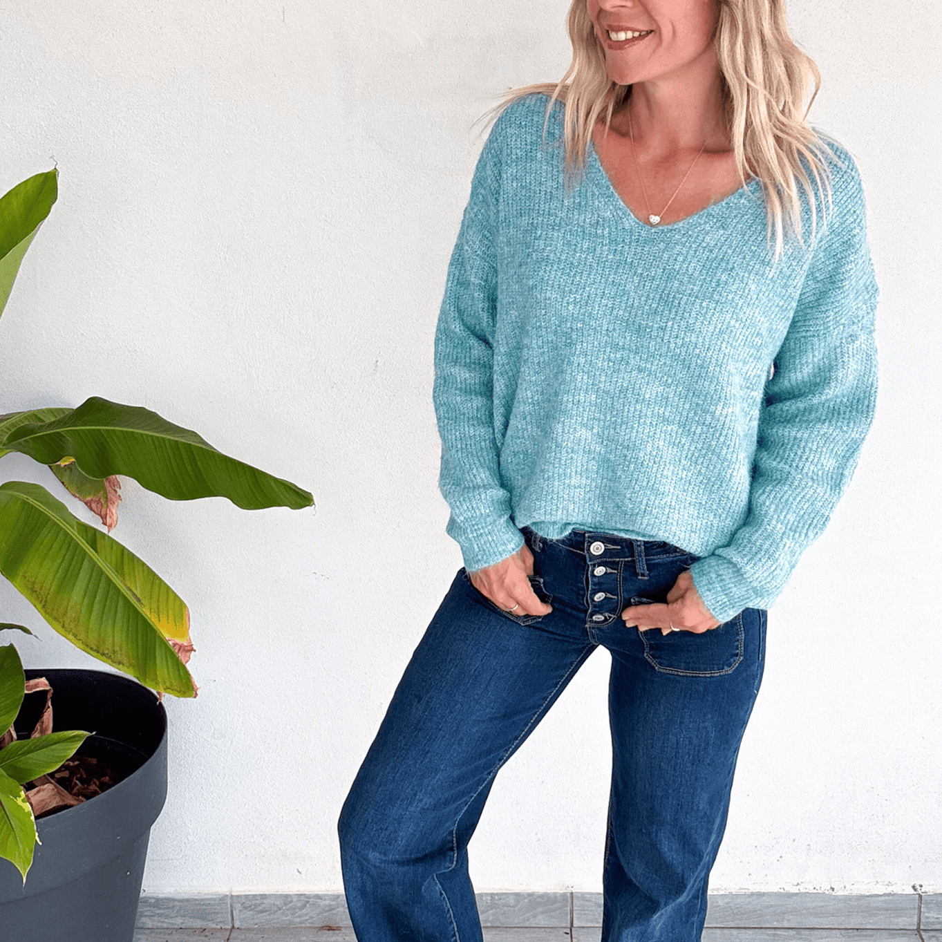 Pull vert col V femme