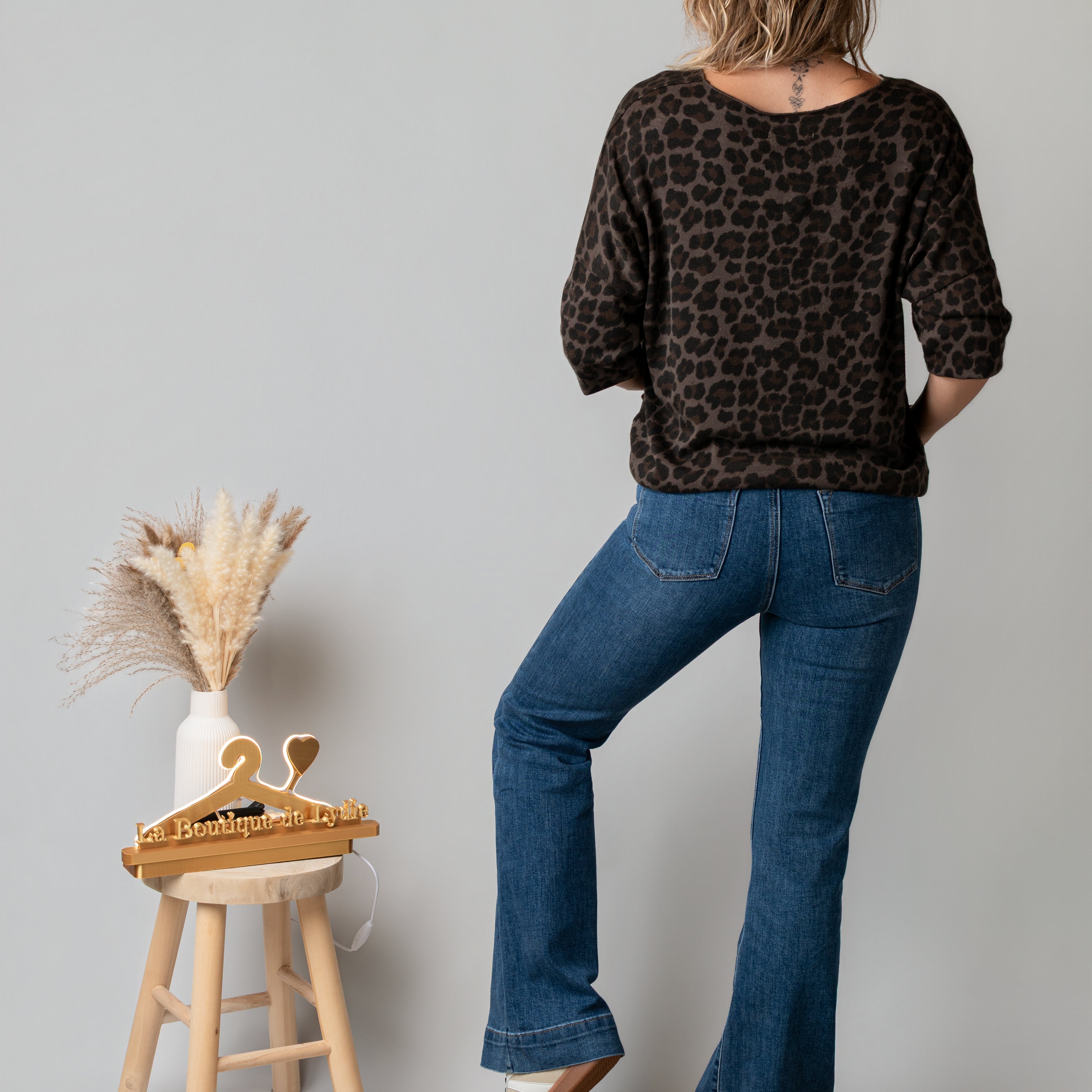 Jean flare bleu brut bas large surpiqué