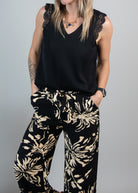 Pantalon fluide large noir et beige femme