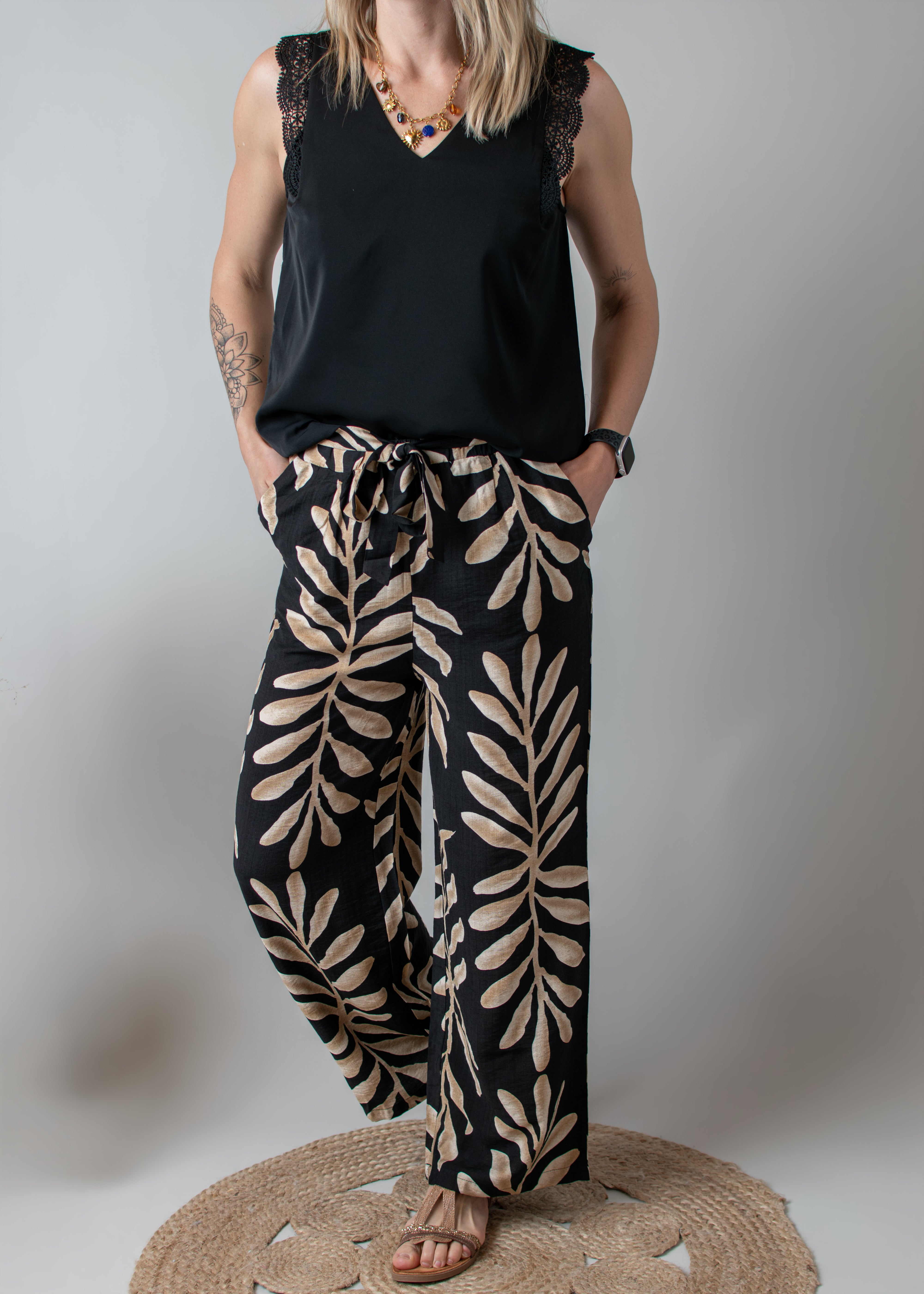 Pantalon fluide noir et beige femme