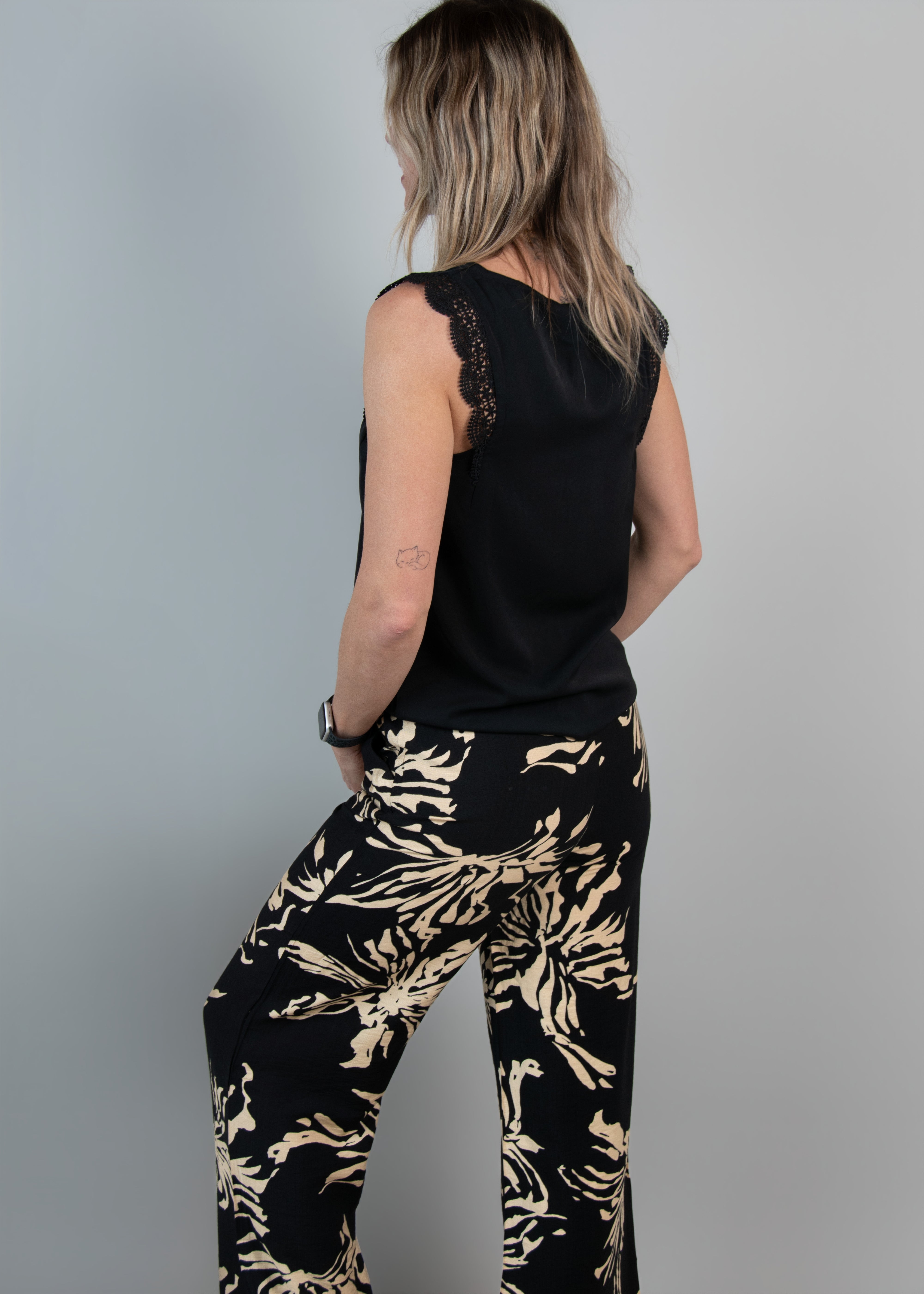 Pantalon fluide large noir et beige femme