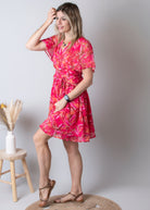 Robe cache-cœur, courte fuchsia