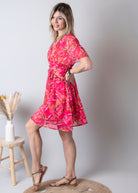 Robe cache-cœur, courte fuchsia