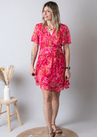 Robe cache-cœur, courte fuchsia