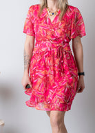 Robe cache-cœur, courte fuchsia