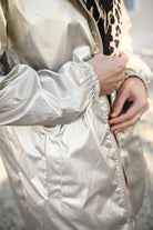 Parka léopard imperméable mi longue réversible or