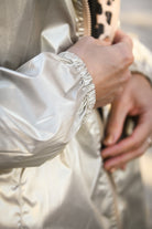 Parka léopard imperméable mi longue réversible or