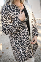 Parka léopard imperméable mi longue réversible or