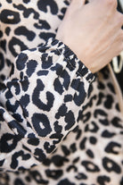 Parka léopard imperméable mi longue réversible or