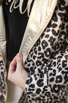 Parka léopard imperméable mi longue réversible or