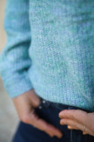 Pull vert col V femme