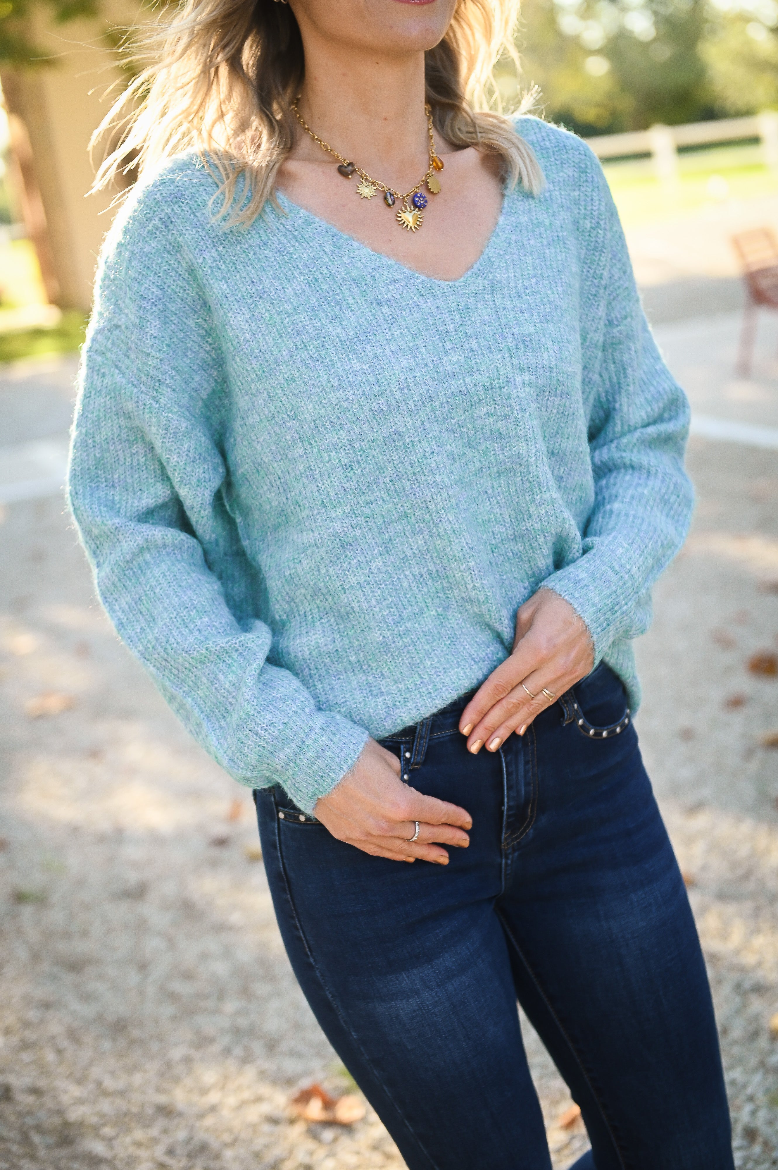 Pull vert col V femme