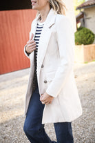 Manteau beige mi long, 4 boutons, avec poches
