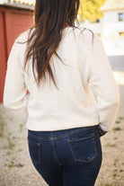 Gilet beige et léopard, broderie coeur