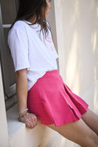 Jupe short fuchsia, plissé sur le devant la boutique de lydie