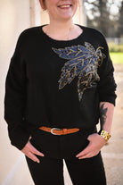 Pull noir feuille sequins la boutique de lydie