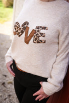 Pull beige love leopard