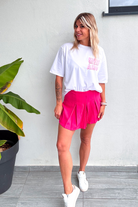 Jupe short fuchsia, plissé sur le devant la boutique de lydie