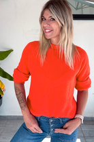 Pull orange, col rond, matière douce la boutique de lydie