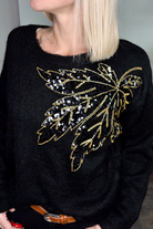 Pull noir feuille sequins 