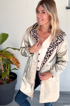 Parka léopard imperméable mi longue réversible or
