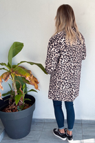 Parka léopard imperméable mi longue réversible or
