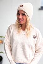 Bonnet en maille avec coeur léopard brodé la boutique de lydie