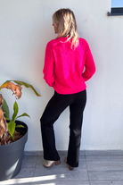 Pull fuchsia femme