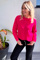 Pull fuchsia femme