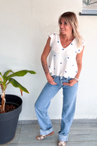 Blouse blanche avec broderie bleu