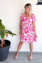 Robe courte écru motifs fuchsia la boutique de lydie