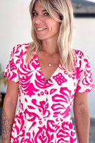 Robe courte écru motifs fuchsia