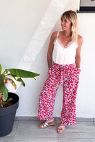 Pantalon fluide large fleuri rouge