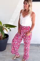 Pantalon fluide large fleuri rouge