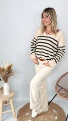 Tenue femme pull marinière loose et pantalon large