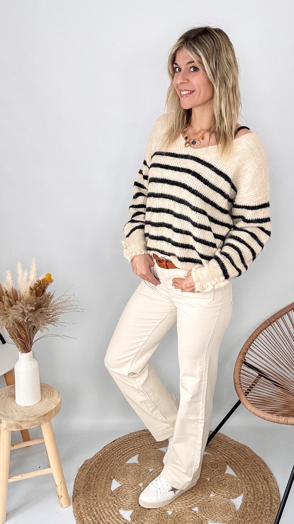 Tenue femme pull marinière loose et pantalon large