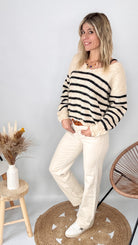 Tenue femme pull marinière loose et pantalon large