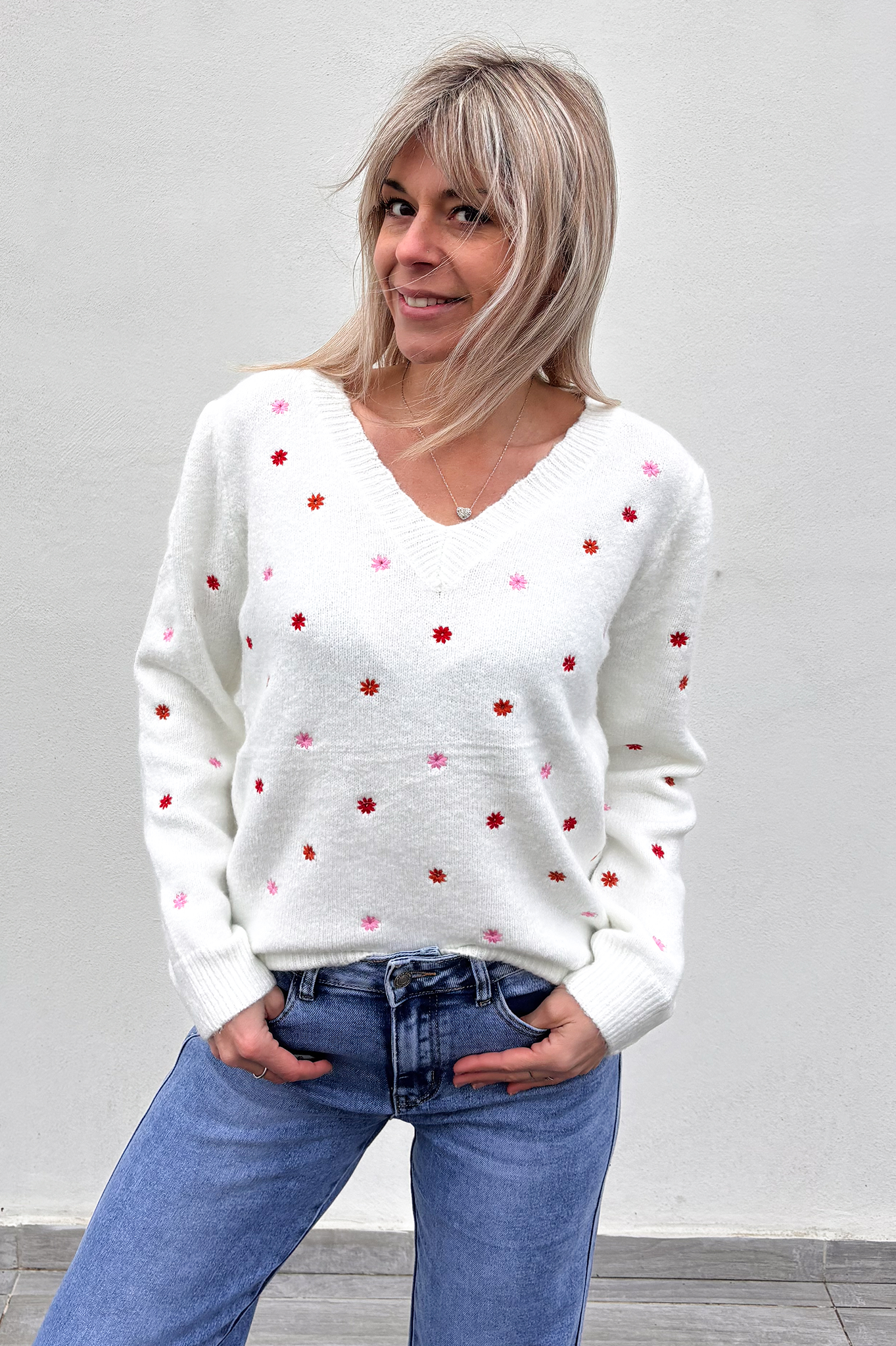 Pull écru avec fleurs