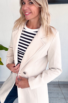 Manteau beige mi long, 4 boutons femme