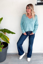 Pull vert col V femme