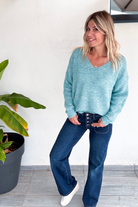 Pull vert col V femme