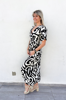 Robe longue blanche fleuri noir la boutique de lydie 