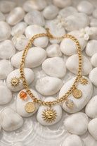 Collier charms soleil en acier inoxydable doré
