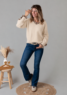 Pull col V beige détails léopard 