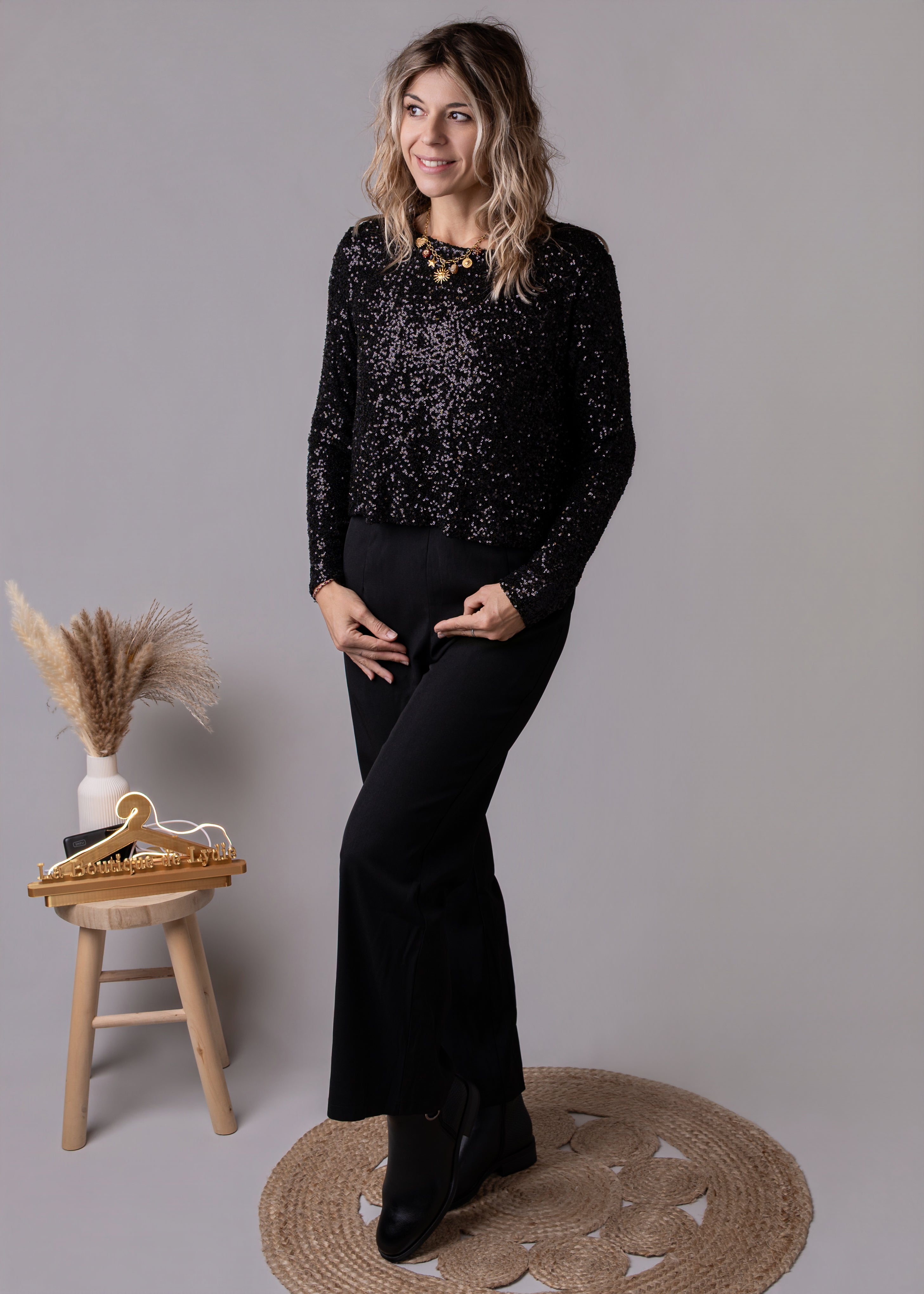 Combinaison pantalon palazzo noire haut sequins et dos nu 