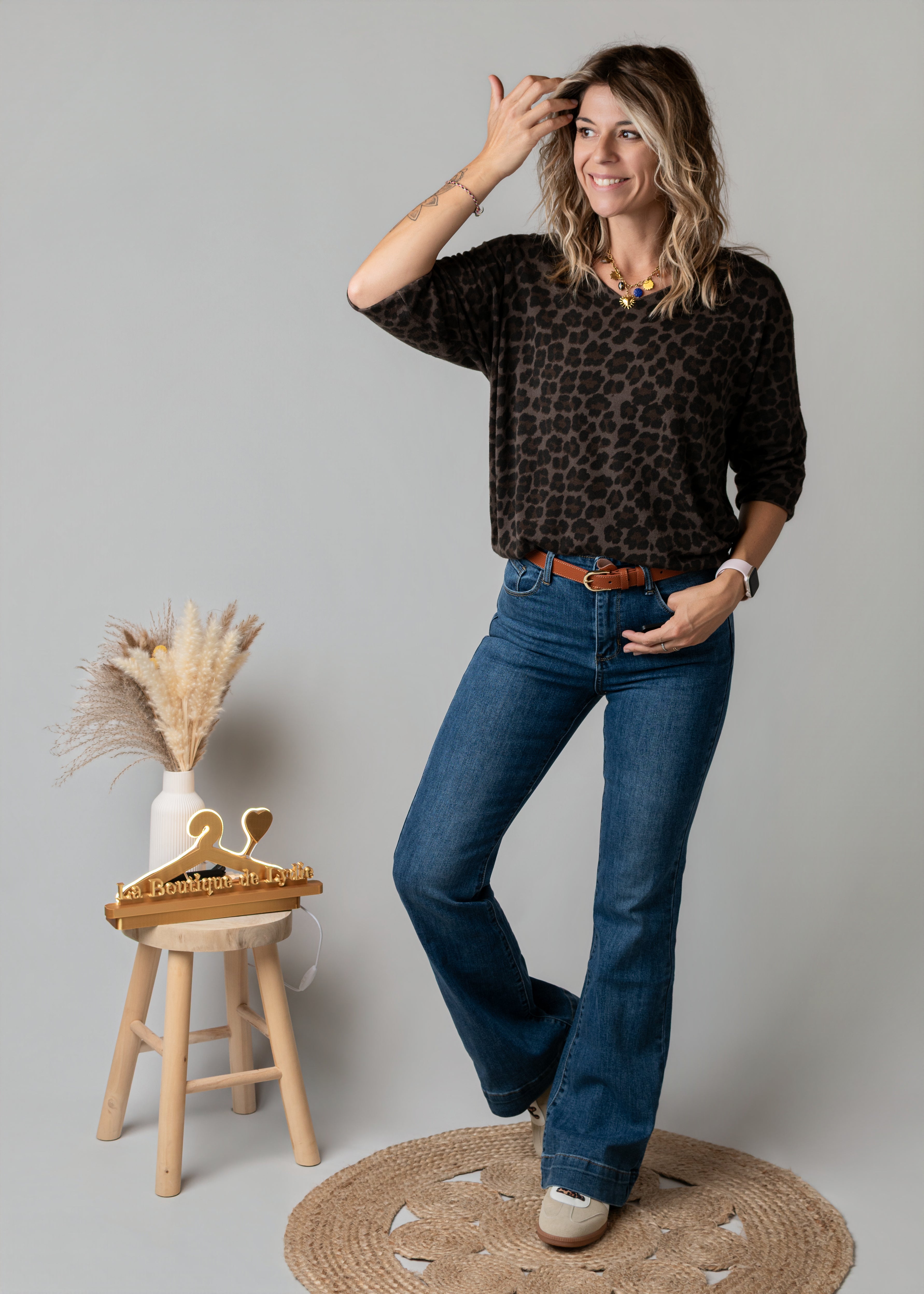 Jean flare bleu brut bas large surpiqué
