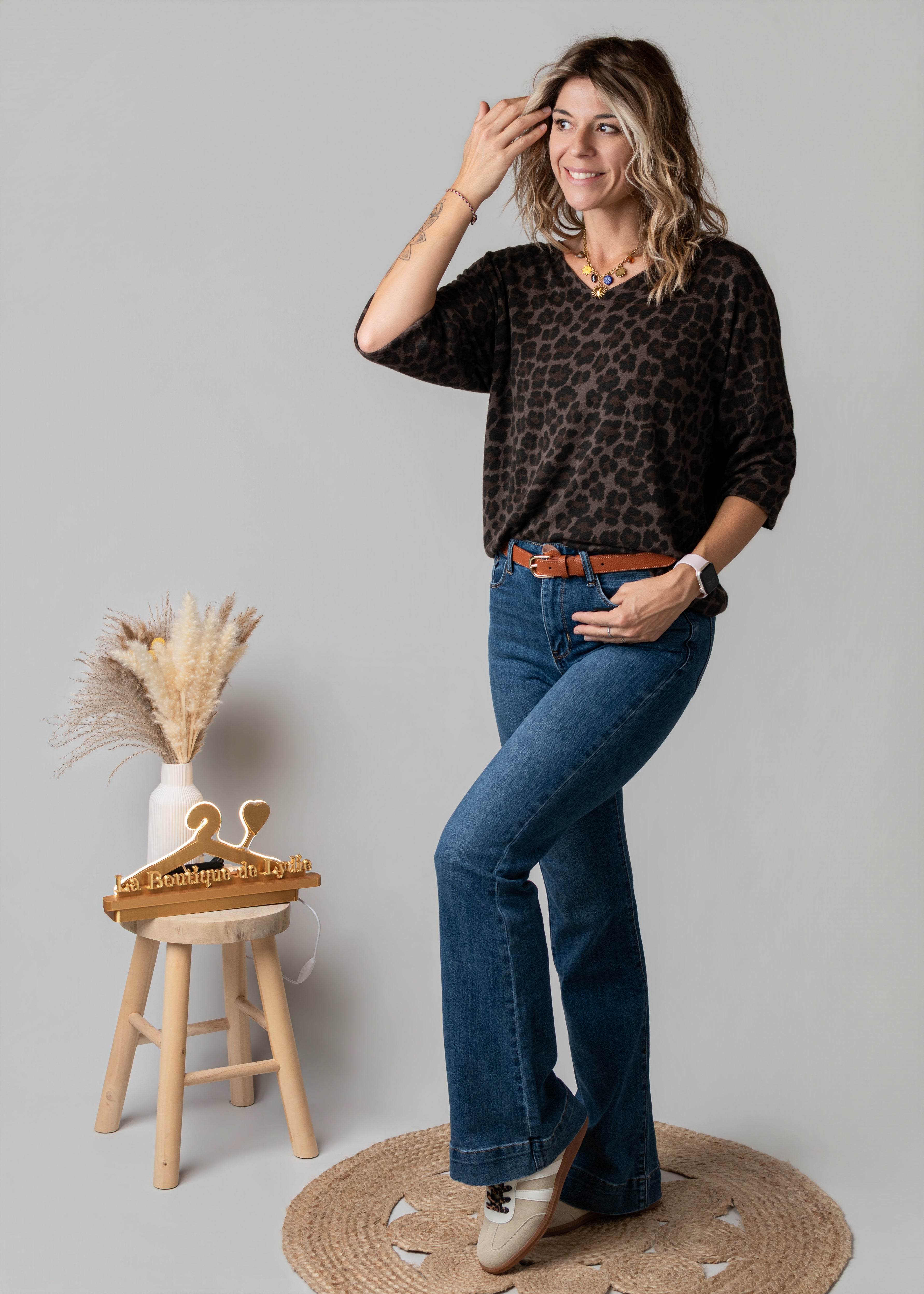 Jean flare bleu brut bas large surpiqué