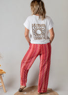 T-shirt blanc col V floqué "Le Soleil" léopard